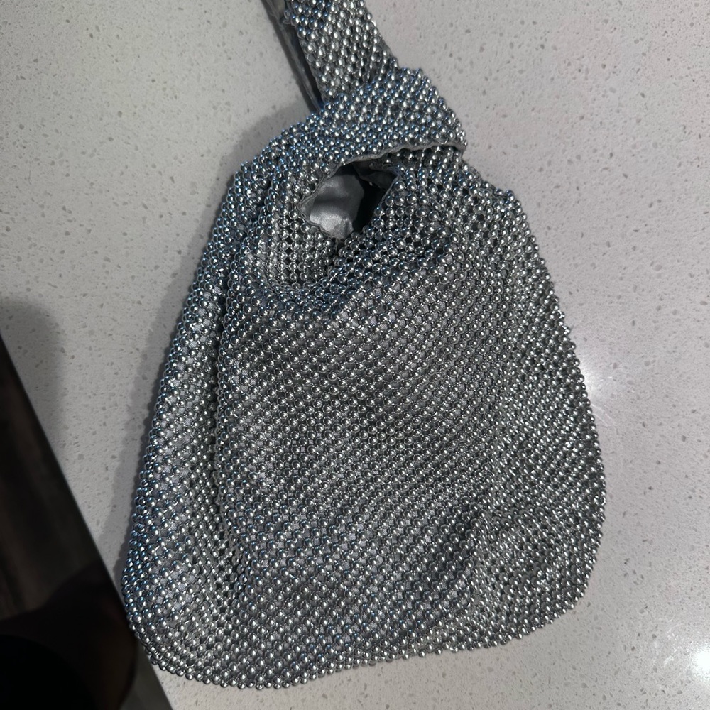 Silver clutch handbag